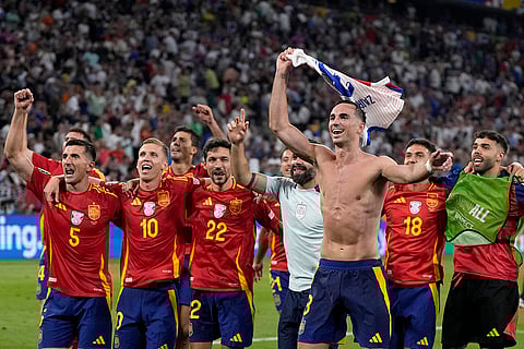 Spain's players celebrate their win against France